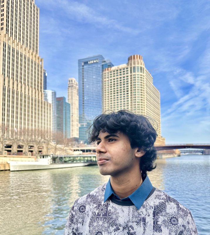 Samarth beside the Chicago River